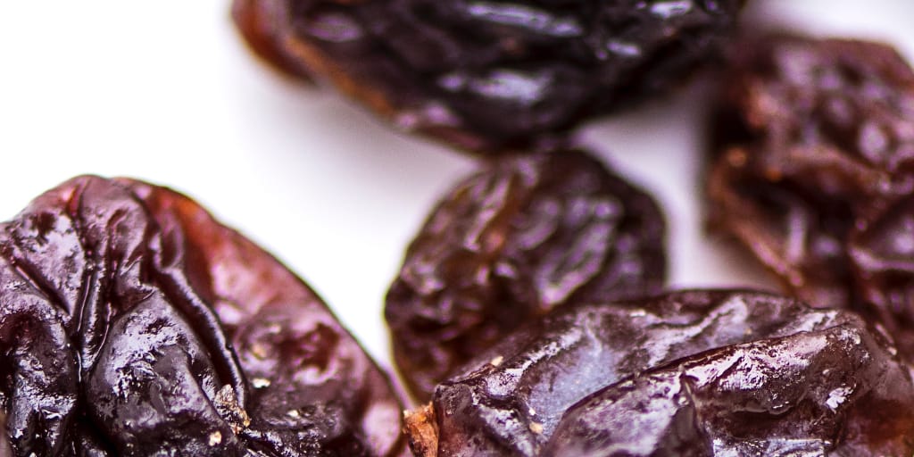 The Flavours We'll Lose. Photo by Erda Estremera on Unsplash. Shows 5 raisins.